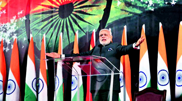 Prime Minister Narendra Modi addresses the Indian community in Shanghai on Saturday. (Source: PTI photo)