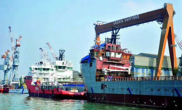 Southern Naval Command Chief Staff Officer (Technical) Commodore Ishan Tandon and Cochin Port Trust Chairman in Charge A V Ramana exchanging the MoU for expansion of the North Jetty at the Kochi Naval Base on Friday