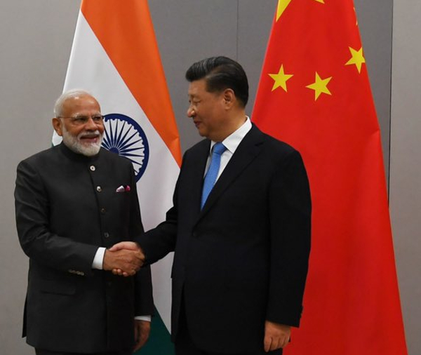 China's Xi invites India's Modi to visit again next year