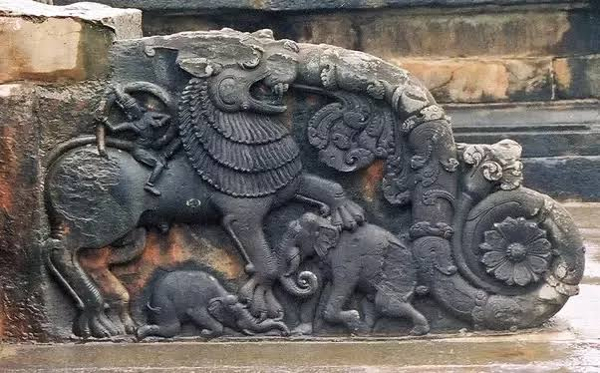The Yali or Vyala is a composite animal, most commonly depicted with a pair of horns, the tusks and trunk of an elephant, the manes and graceful body of a lion, and the tail of a serpent. In this form it is called a gaja-vyala i.e. elephant-vyala.