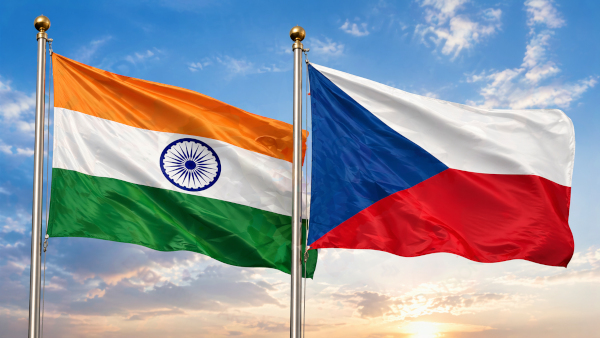 Flags waving under a warm sky