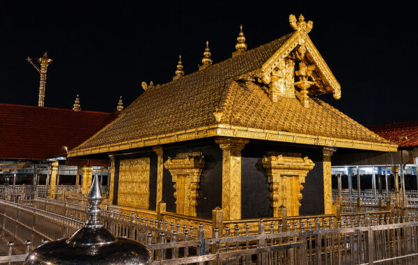 Sabarimala Golden temple with ornate fencing at night