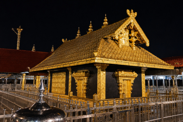 Sabarimala Golden temple with ornate fencing at night
